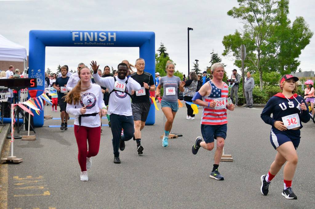 Participants take off from the starting line on July 4. Photo by Bruce Honda
