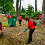 Volunteers provide yard services to FUSION Transitional Housing homes and senior citizens on July 9. Photo courtesy of Shelley Pauls