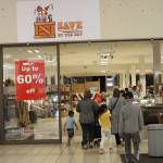 Customers enter Save By The Day on a Tuesday, taking advantage of the $5 item bins. Photo by Bailey Jo Josie/Sound Publishing.