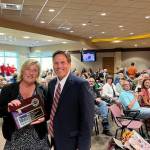 Cheryl Hurst stands with Mayor Jim Ferrell after being presented with a Key to the City. Photo courtesy of the City of Federal Way