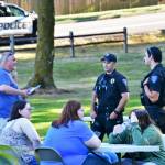 Members of the Federal Way Police Department chat with community members on Aug. 2. Photo by Bruce Honda