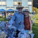Couple wins two baskets and a massage gift certificate at silent auction. Photo by Sarah Fox.