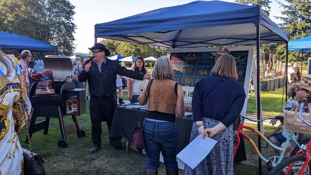 Auctioneer Fred Granados at Almost Live auction at FUSION Art Event August 3. Photo by Sarah Fox.