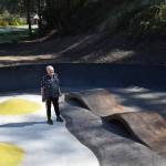 John Hillding stands in the center of the Bacon and Eggs skatepark, which he designed. The Wilkeson skatepark came about from a state grant, Grindline Skateparks, organizing by Hillding and city leaders, and a lot of volunteers. Photo by Alex Bruell.