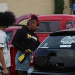 Jaree Johnson cleans her car on Aug. 27. Johnson won the 25 Years and New Stock model category with her 2007 Dodge Magnum. Olivia Sullivan/the Mirror