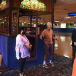 In the center, El Centro de la Raza Executive Director Estela Ortega and Pattisons West owner Mike Pattison discuss the future of the rink to a group touring the facility. U.S. Rep. Adam Smith stands to the right. Alex Bruell/Sound Publishing