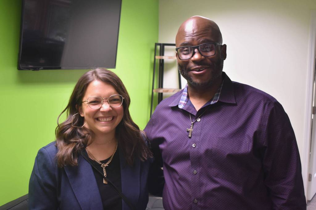Lisa Brooks, project manager at King County Community and Human Services, poses for a picture with Louis Guiden.