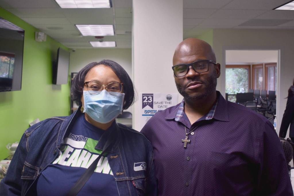 Cynthia Ricks-Maccotan and Louis Guiden pose for a picture.
