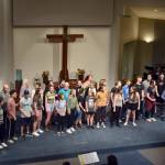 The cast of The Music Man gathers together at the end of a musical number at St. Lukes Church. Alex Bruell/Sound Publishing