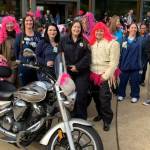 Riders from a previous Wigged Out Ride assemble at St. Anthony Hospital in Gig Harbor. Image courtesy Susan Scanlon.