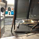 The front entrance to DJ Trophy, Awards & Engraving is heavily damaged after a suspect rammed a truck into the building and stole several items on Sept. 30. Federal Way Police photo