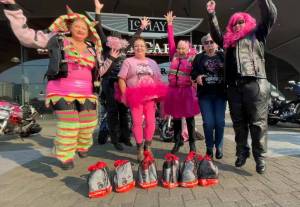 Photo by Pat Scanlon
Pictured here is the survivor group, which led the 80 motorcyclists on this years Wigged Out Ride.