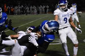 Senior Jaylon Jenkins coming down with an impressive catch on the near sideline. Ben Ray/the Mirror