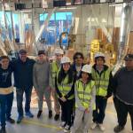 Students stand for a photo with Federal Way High School teacher Larry DuFresne, second from left. Olivia Sullivan/the Mirror