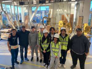 Students stand for a photo with Federal Way High School teacher Larry DuFresne, second from left. Olivia Sullivan/the Mirror