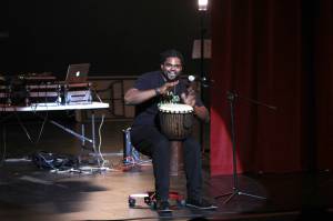 Photos by Olivia Sullivan/the Mirror
Evan Cook, who coordinated the benefit concert, spoke about importance of community safety on Nov. 19 after performing.