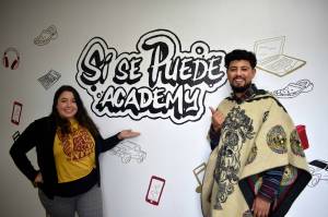 Photo by Alex Bruell/the Mirror
Sí se Puede Program Manager Elsa Alvarado and student support advocate Emmanuel Lopez pose for a picture by the entrance of the programs new home near where 16th Avenue South meets Highway 99 in Federal Way. Sí se Puede is operated by El Centro de la Raza and aims to help young people get their GED and on track toward meaningful careers.