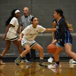 Todd Beamer guard Aaliyah Chappell locks down the Mount Rainier ball handler in the first quarter.