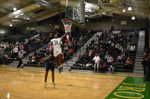 Auburn Trojans and Luvens Valcin come in at number 2 in the latest power rankings for boys basketball. Ben Ray/Sound Publishing