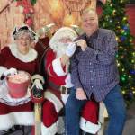 SKFR Assistant Chief Kevin Crossen pleads his case to Santa Claus and Mrs. Claus to end up on the nice list this year at the first-ever SKFR Santa event held on Sunday, Dec. 18. Photo courtesy of South King Fire and Rescue