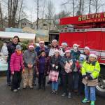 SKFR members bring donations for the Federal Way Senior Center Food Bank on Dec. 19. Photo courtesy of South King Fire and Rescue