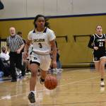 Junior Tamairah Allen leading the Gators on a fast break. Ben Ray/the Mirror