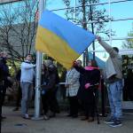 Elected officals help raise the Ukrainian flag on Friday, Feb. 25. Olivia Sullivan/the Mirror