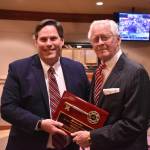 Mayor Jim Ferrell, left, presents Bob Roegner with a Key to the City on Jan. 4. Alex Bruell/The Mirror