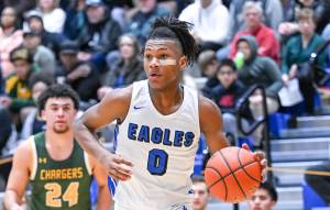 Senior Vaughn Weems looks to damage the Kentridge defense. Photo courtesy of Dee Torres