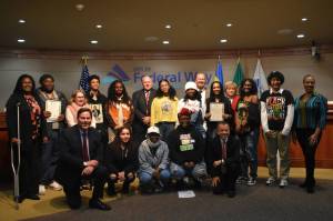 Federal Way councilmembers and the mayor pose for a photo with students from Thomas Jefferson and Decatur high schools during the citys proclamation of Black History Month. Alex Bruell / The Mirror