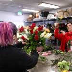 Employees Molly Bricker, left, and Brianna Sterling craft bouquets on Valentines Day at the Federal Way flower shop. Olivia Sullivan / the Mirror