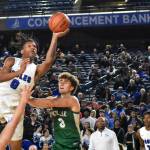 Federal Way senior Vaughn Weems absorbs the contact on his way to the rack. Ben Ray / The Mirror