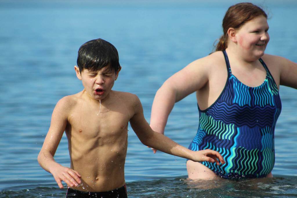More than a dozen people plunged into the chilly waters of the Puget Sound on Saturday, March 10, for the Marine Hills Swim and Tennis Club Polar Bear Plunge. Alex Bruell / The Mirror