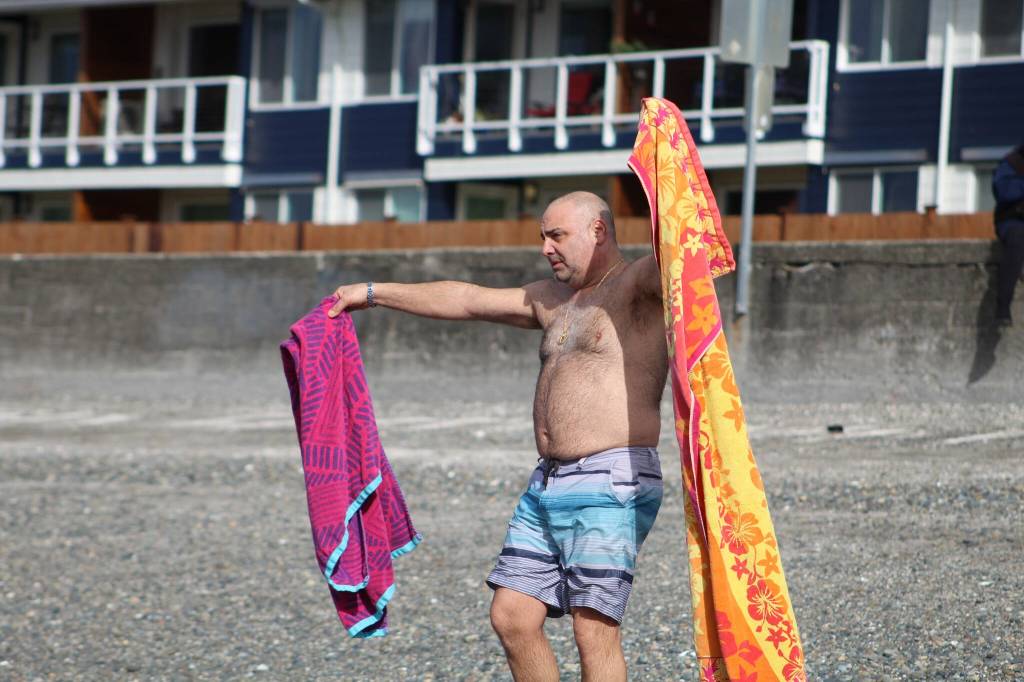 More than a dozen people plunged into the chilly waters of the Puget Sound on Saturday, March 10, for the Marine Hills Swim and Tennis Club Polar Bear Plunge. Alex Bruell / The Mirror