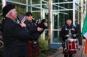 Neil Hubbard and two of the three present members of the Puget Sound Firefighters Pipes and Drums perform prior to the St. Patricks Day ceremony. Alex Bruell / The Mirror