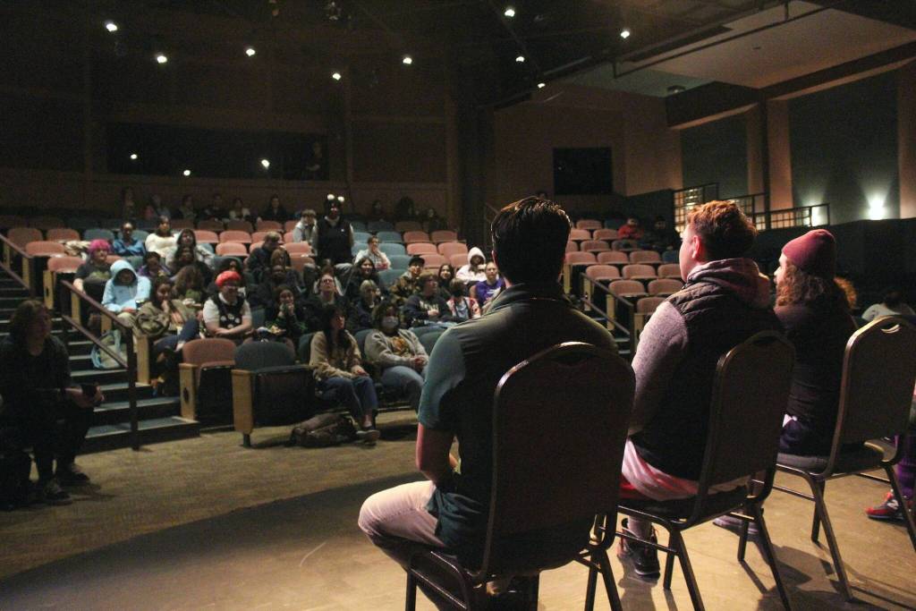 Alex Bruell / The Mirror
Amaya Harris, a sophomore at Todd Beamer High School, poses a question to actors from El Coquí Espectacular and the Bottle of Doom at the Knutzen Family Theater on April 10 during a morning showing of the play.