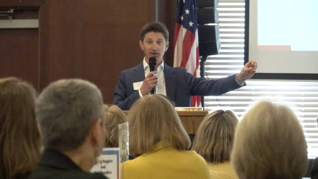 Keynote speaker Gregg Colburn presents at the myth-busters luncheon on May 9. Photo courtesy of Michael Dziak, FUSION