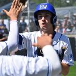 Jay ONeill gets a lot of high fives as he scores the second run of the game for the Eagles. Ben Ray / The Mirror