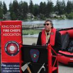 Tony Gomez, Violence and Injury Prevention manager for Public Health - Seattle & King County, speaks on water safety at Steel Lake Park in Federal Way on May 23. Olivia Sullivan / The Mirror