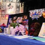 A memorial at Stars Bar & Grill includes photos, cards, flowers and trinkets set in reverence of Jessyca Hohn and Katie Duhnke, who were killed just outside the bar May 21. Alex Bruell / The Mirror