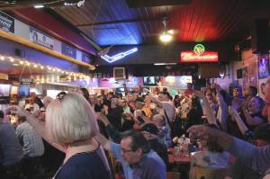 Patrons at Stars Bar & Grill take a shot in memory of Katie Duhnke and Jessyca Hohn on Wednesday, May 31, during a celebration of life for the two women. Alex Bruell / The Mirror