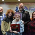 Hope Elder poses for a photo with her family during a December 2022 Federal Way City Council Meeting. Photo by Alex Bruell/the Mirror