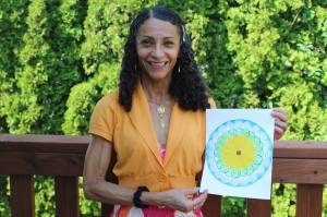 Alex Bruell / The Mirror
Ivone Langford, a Federal Way resident, holds her design that will be used at the upcoming Sound Transit link light rail Kent / Des Moines station.