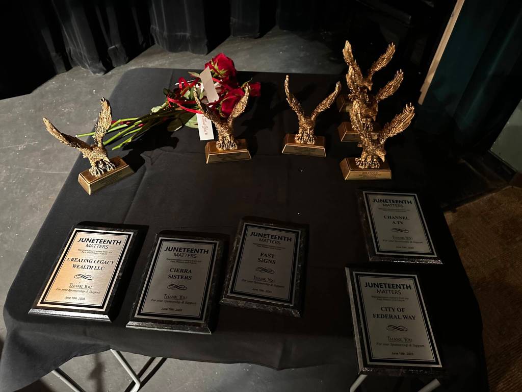 A photo of the plaques and awards that Tirzah Idahosa gave out at the June 19 event. (Photo by Joshua Solorzano/The Mirror)