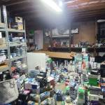 Stolen merchandise lines the shelves and floor of another room. (Courtesy of the Renton Police Department)