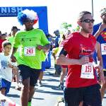 File photo
Runners cross the finish line during the annual Miles for Meso 5k on July 4 in years past.