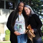 Alex Bruell / The Mirror 
Deena Rose, left, and Chris Buchanan stand outside Buchanans office in Federal Way. Buchanan has written a book for youth exploring their grief.