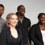 From left to right: mentor Ron Howell, resource navigator Adriane Karg, executive director DeVonte Parson and COO Kechi Amaefule pose for a photo at the Pro Se Potential office in Federal Way. (Photo by Alex Bruell / The Mirror)