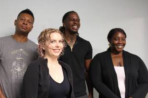 Photo by Alex Bruell / The Mirror
From left to right: mentor Ron Howell, resource navigator Adriane Karg, executive director DeVonte Parson and COO Kechi Amaefule pose for a photo at the Pro Se Potential office in Federal Way.