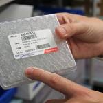 Photo by Alex Bruell / The Mirror
After many steps of processing and extracting a sample sent to the lab, the actual drug sample tested by the toxicology lab machines is often as small as one of these vials, which Federal Way toxicology lab manager Brian Capron points to in this picture.